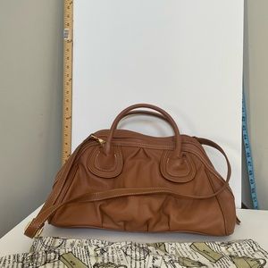 NWOT gorgeous convertible shoulderbag/handbag. Includes dust bag.